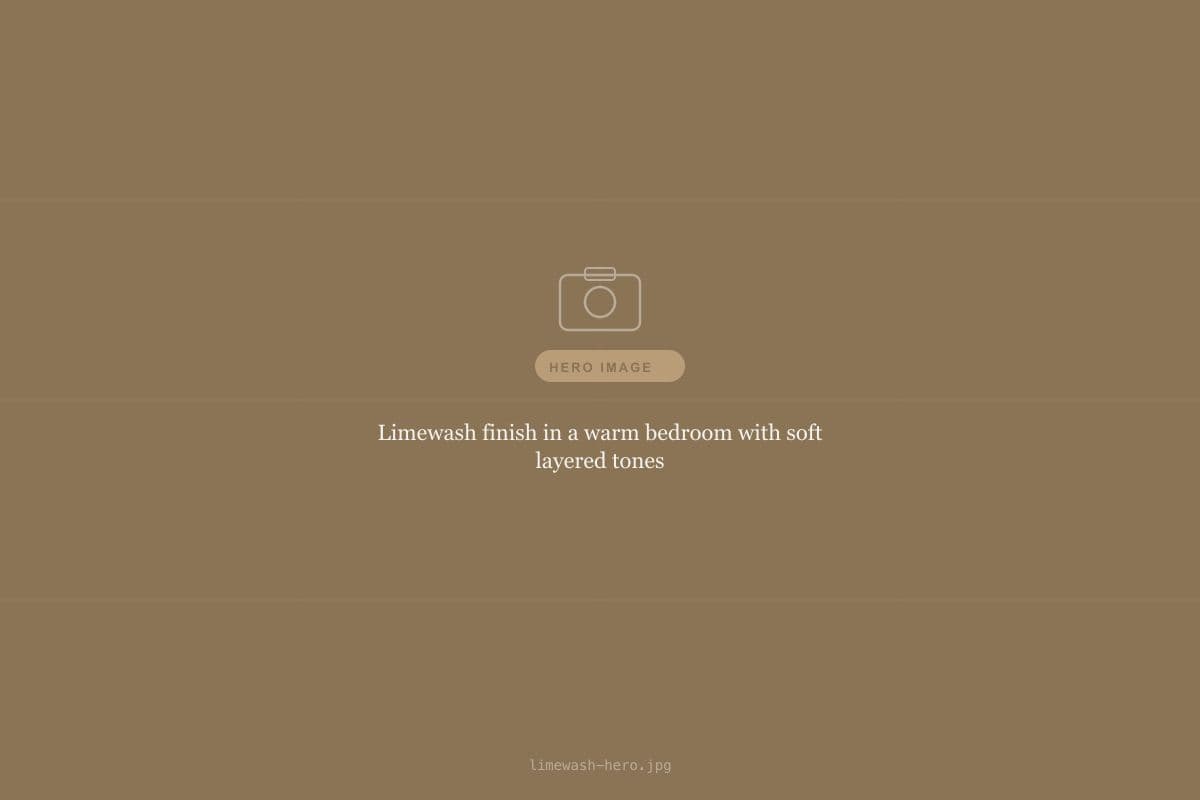 Limewash finish in a warm bedroom with soft layered tones